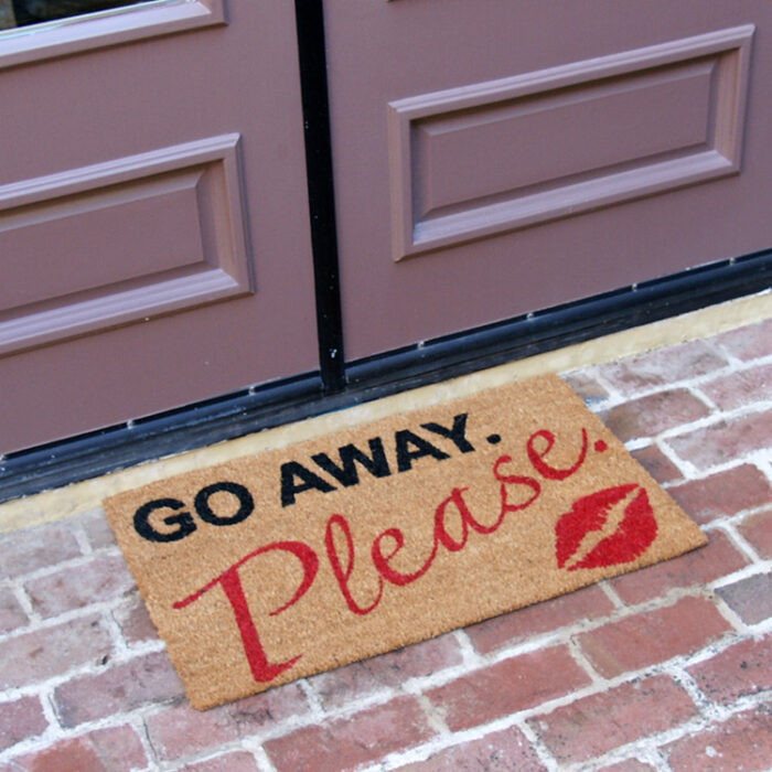 A polite kiss go away please welcome mat