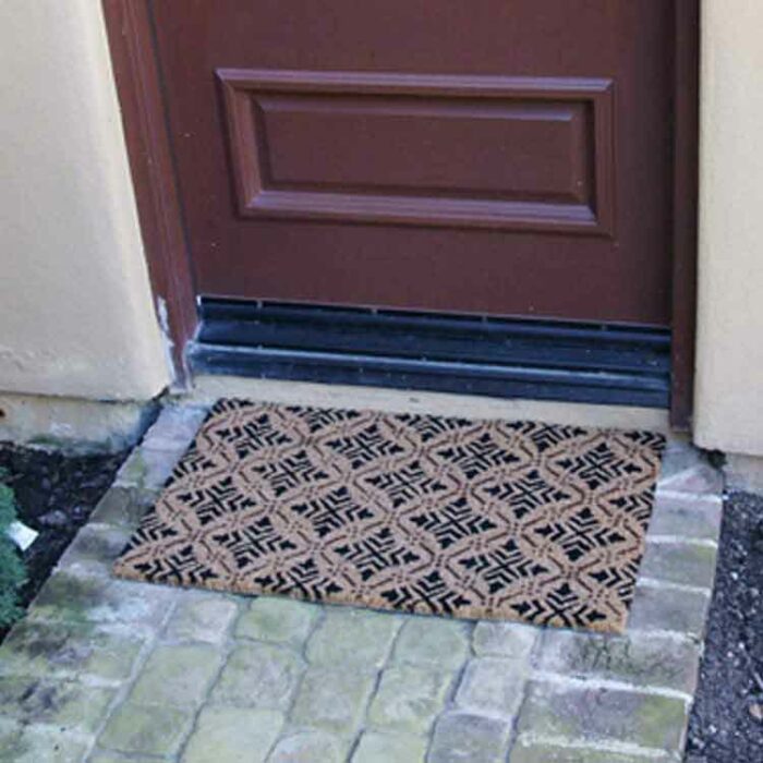 Classic Fleur de Lis French mat in front of door