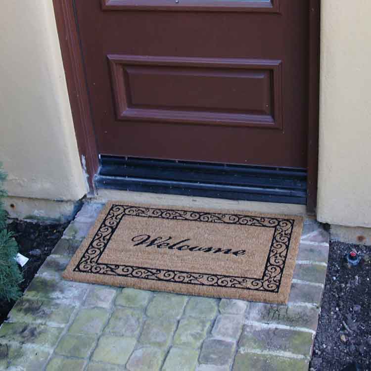 Welcome mat in front of an entrance