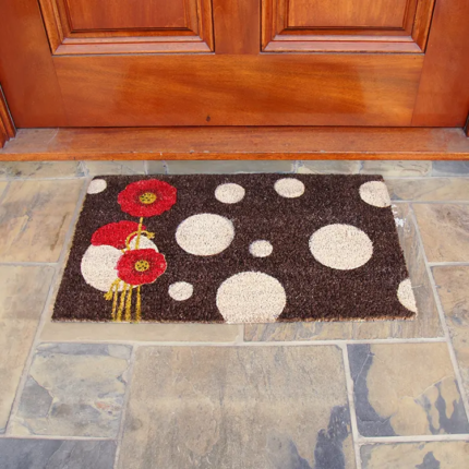 rogue contemporary floral doormat in front of red door