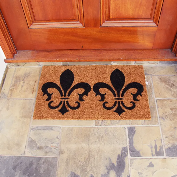 The Clovis Legend Inspired French Mat in Brown and Black in front of a red door