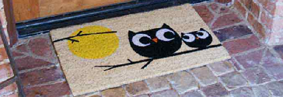 Affection owl pair sitting on branch doormat at front door