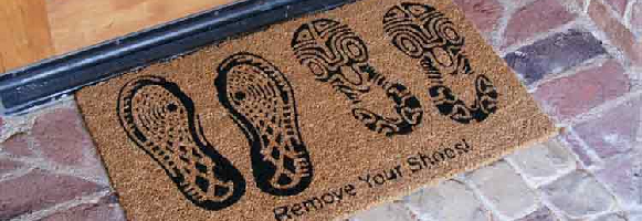 Doormats with picture of shoes and remove your shoes sign