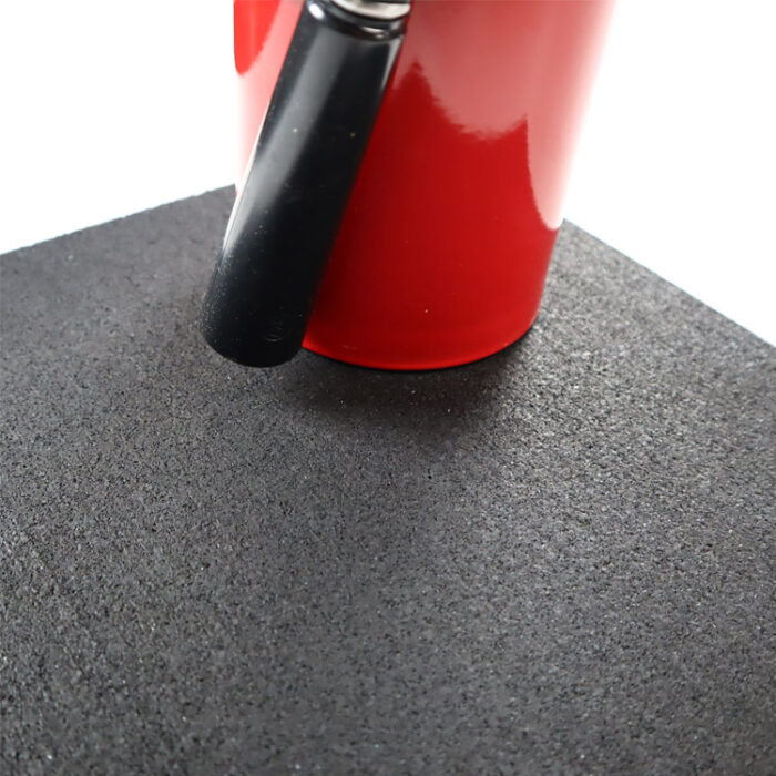 fire extinguisher on top of cut rubber